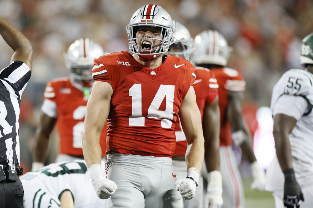 Ohio State defensive lineman Beau Atkinson celebrates his sack against Ohio during the second half of an NCAA college football game, Saturday, Sept. 13, 2025, in Columbus, Ohio. (AP Photo/Jay LaPrete)