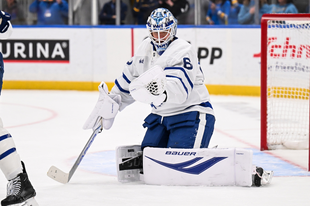 FILE - Toronto Maple Leafs goaltender Joseph Woll (60) makes a glove save against the Toronto Maple Leafs during the second period of an NHL hockey game, March 28, 2026, in St. Louis. (AP Photo/Connor Hamilton, File)