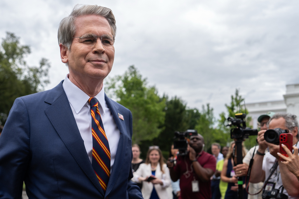 Treasury Secretary Scott Bessent walks past reporters following an interview with Fox News outside the White House, Thursday, July 30, 2026, in Washington. (AP Photo/Julia Demaree Nikhinson)