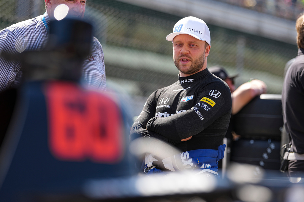 FILE - Felix Rosenqvist, of Sweden, waits for his turn during qualification for the Indianapolis 500 auto race in Indianapolis, May 17, 2025. (AP Photo/Michael Conroy, File)