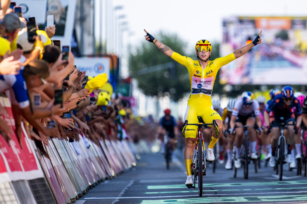 Netherlands' Lorena Wiebes of team SD Worx Protime celebrates crossing the finish line to win the second stage a 149 km from Aigle to Geneva during the Women's Tour de France (Tour de France Femmes), in Geneva, Switzerland, Sunday, Aug. 2, 2026. (Jean-Christophe Bott/Keystone via AP)
