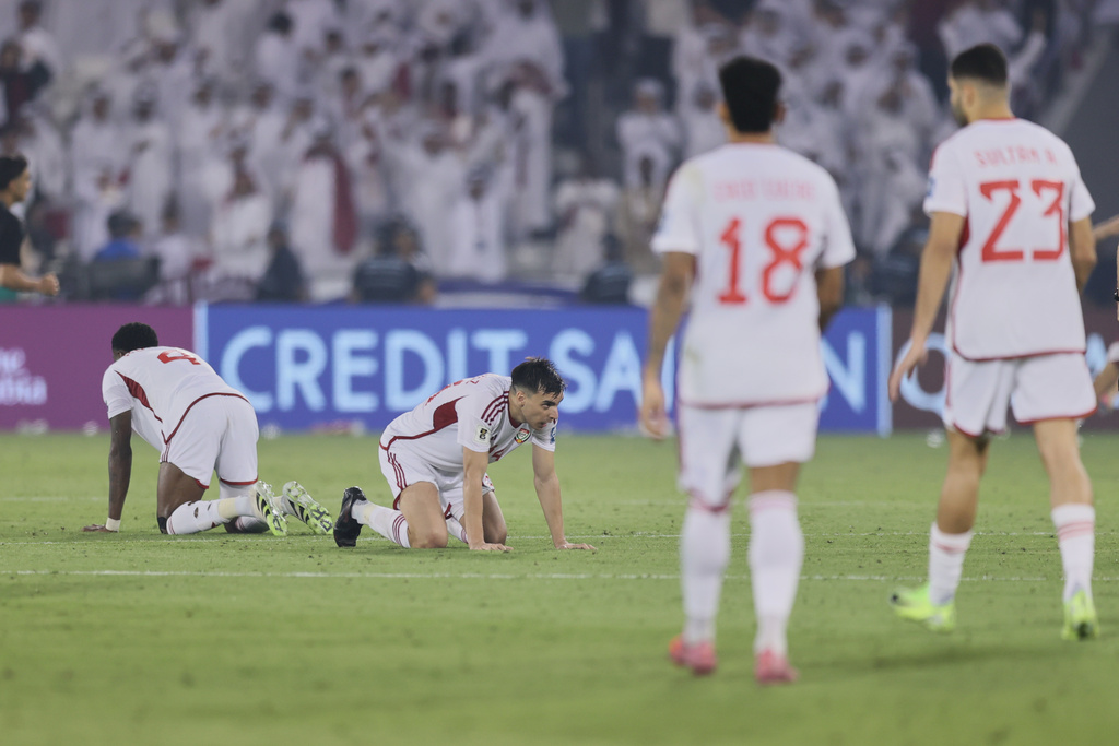 United Arab Emirates players are seen after the end of the 2026 World Cup qualifying soccer match between Qatar and United Arab Emirates at the Hamad Bin Jassim Stadium in Doha, Tuesday, Oct. 14, 2025. (AP Photo/Hussein Sayed)