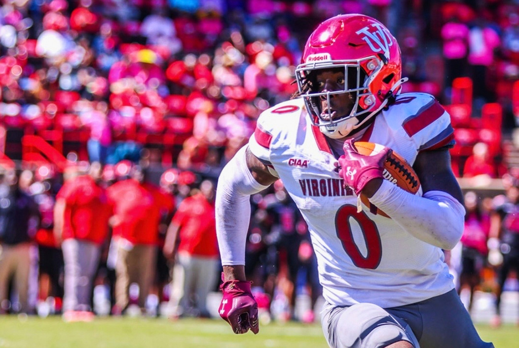 In this image provided by Virginia Union Athletics, Virginia Union running back Curtis Allen carries the ball during a college football game. (Virginia Union Athletics via AP)