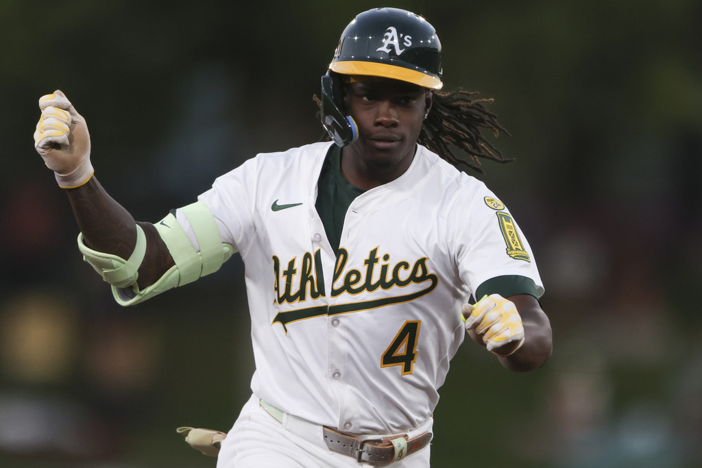Athletics' Lawrence Butler jogs around the bases after hitting a solo home run during the third inning of a baseball game against the Tampa Bay Rays, Wednesday, Aug. 13, 2025, in West Sacramento, Calif. (AP Photo/Scott Marshall)