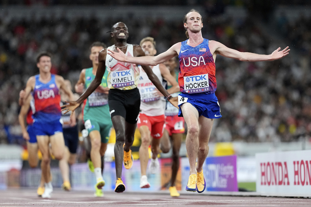 United States' Cole Hocker celebrates winning the gold in the men's 5,000 meters final at the World Athletics Championships in Tokyo, Sunday, Sept. 21, 2025. (AP Photo/Petr David Josek)