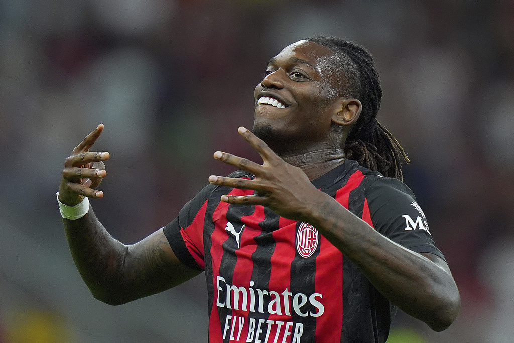 AC Milan's Rafael Leao celebrates after scoring the opening goal during the round of 64 of the Italian Cup soccer match between Milan and Bari, at San Siro Stadium in Milan, Italy, Sunday, Aug. 17, 2025. (Spada/LaPresse via AP)