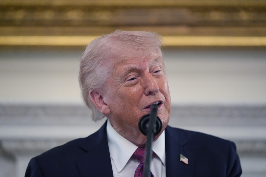 President Donald Trump speaks during an event for NCAA national champions in the State Dining Room of the White House, Tuesday, April 21, 2026, in Washington. (AP Photo/Alex Brandon)