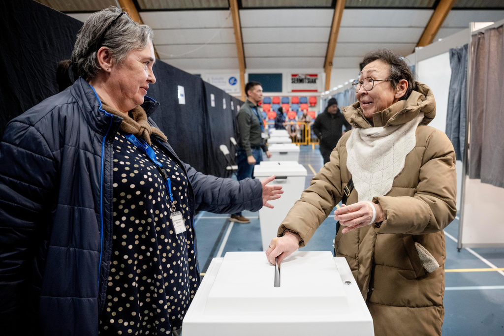 The polling station in Nuuk closes and the Greenlandic votes are counted in Nuuk, Greenland, Tuesday, March 24, 2026. Greenland is represented in the Danish Parliament with two mandates, which are elected every four years in a single electoral district. (Oscar Scott Carl/Ritzau Scanpix via AP)