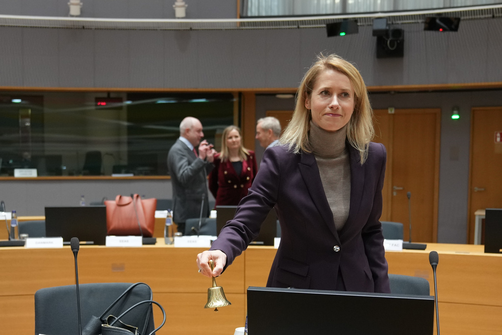 European Union foreign policy chief Kaja Kallas rings a bell to signify the start of a meeting of EU foreign ministers at the European Council building in Brussels, Monday, Dec. 15, 2025. (AP Photo/Virginia Mayo)