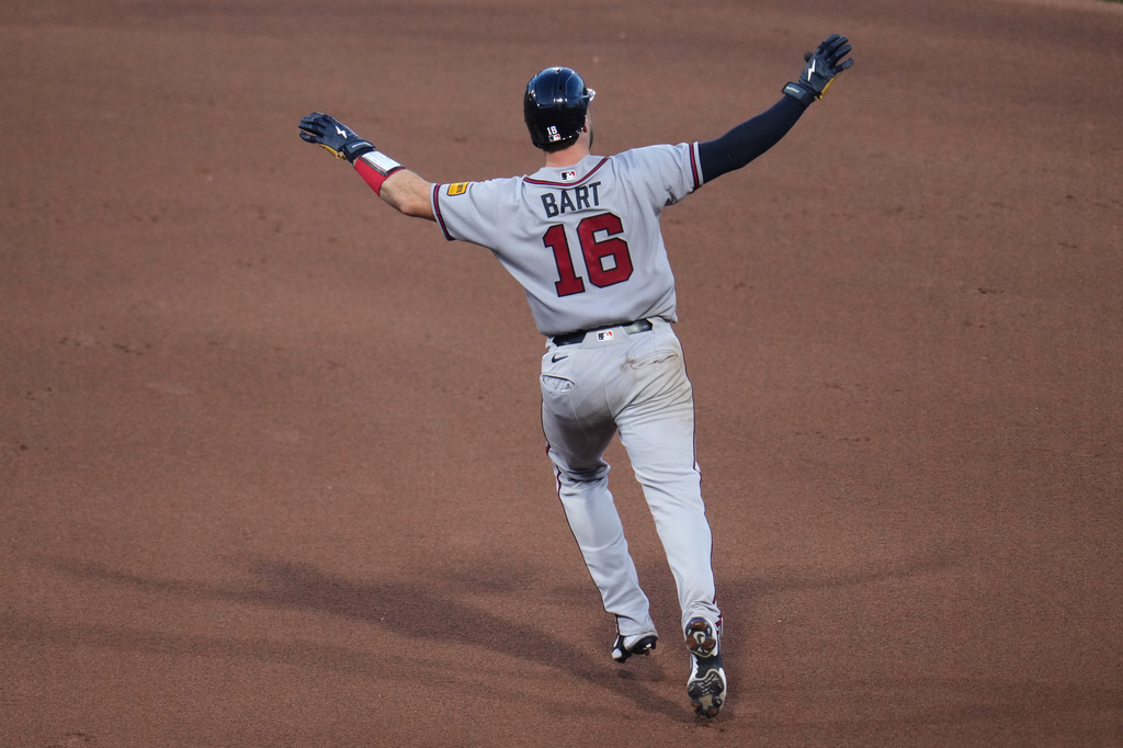 Atlanta Braves' Joey Bart rounds the bases after hitting a two-run home rum off Pittsburgh Pirates pitcher Dennis Santana during the eighth inning of a baseball game in Pittsburgh, Wednesday, July 8, 2026. (AP Photo/Gene J. Puskar)