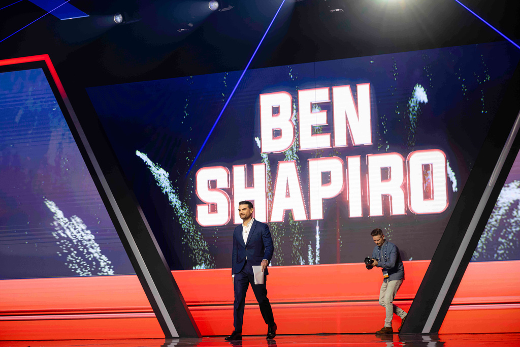 Ben Shapiro walks on stage before speaking during Turning Point USA's AmericaFest 2025, Thursday, Dec. 18, 2025, in Phoenix. (AP Photo/Jon Cherry)