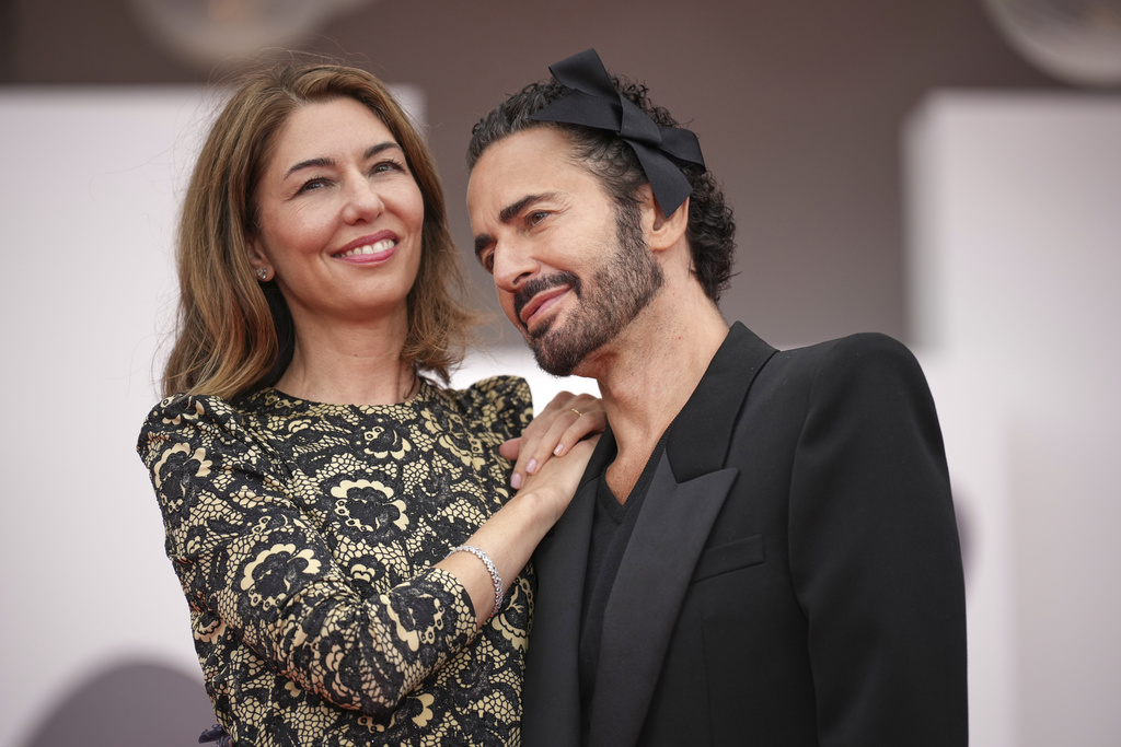 Director Sofia Coppola, left, and designer Marc Jacobs pose for photographers on the red carpet for the film 'Marc by Sofia' during the 82nd edition of the Venice Film Festival in Venice, Italy, on Tuesday, Sept. 2, 2025. (Photo by Alessandra Tarantino/Invision/AP)