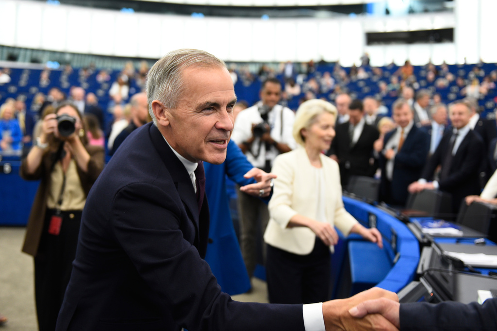 Canada's Prime Minister Mark Carney, left, and European Commission President Ursula von der Leyen arrive for the annual State of the European Union at the European Parliament in Strasbourg, eastern France, Wednesday, Sept 16, 2026. (AP Photo/Pascal Bastien)