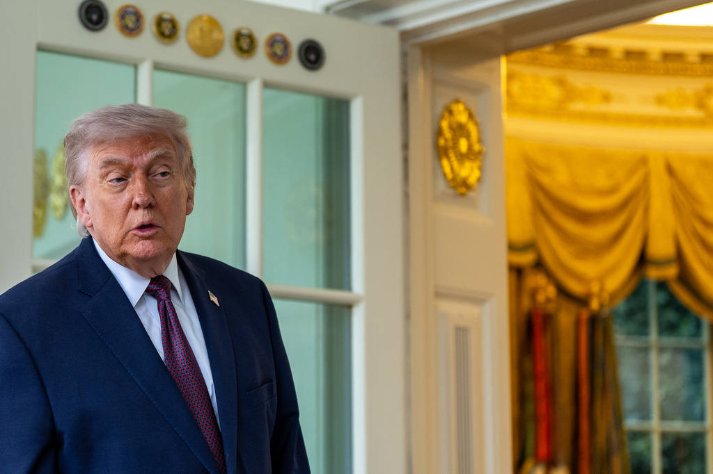 President Donald Trump speaks with reporters outside the Oval Office of the White House, Monday, April 13, 2026, in Washington. (AP Photo/Alex Brandon)