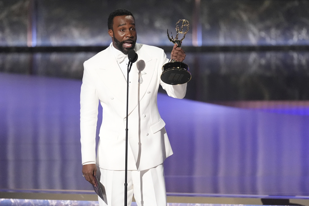 Tramell Tillman accepts the award for outstanding supporting actor in a drama series for "Severance" during the 77th Primetime Emmy Awards on Sunday, Sept. 14, 2025, at the Peacock Theater in Los Angeles. (AP Photo/Chris Pizzello)