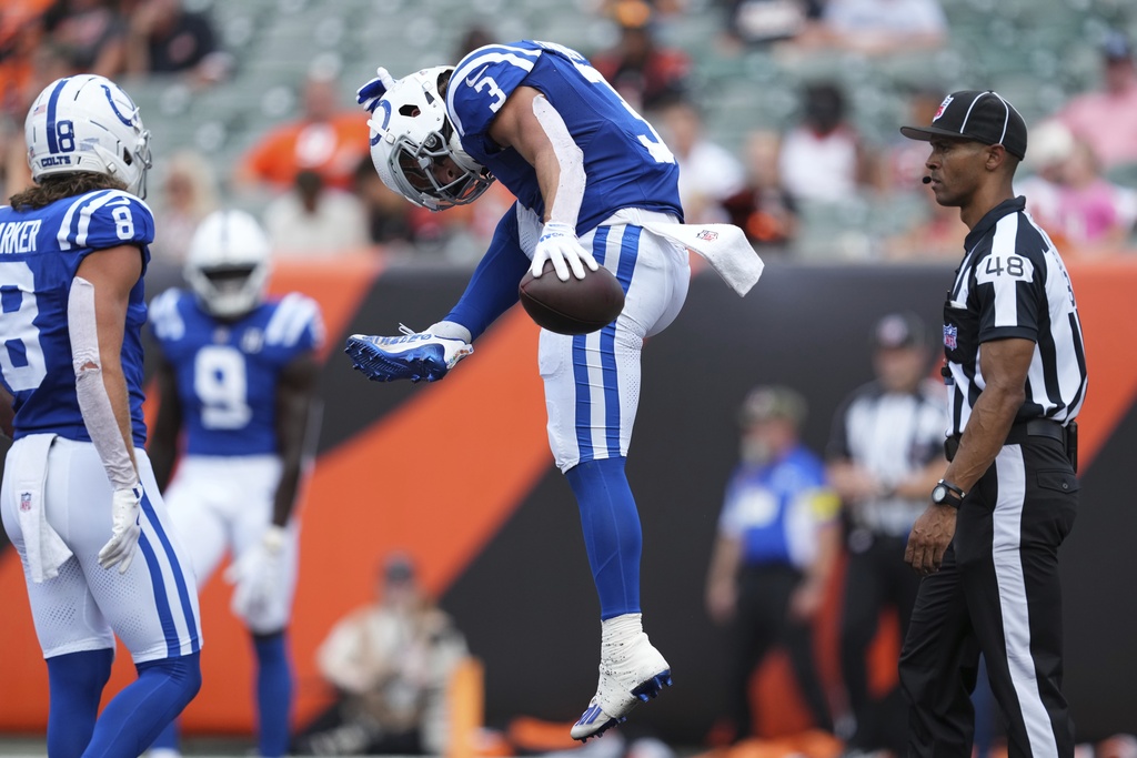 Indianapolis Colts wide receiver Coleman Owen (3) celebrates a touchdown catch during the second half of a preseason NFL football game against the Cincinnati Bengals, Saturday, Aug. 23, 2025, in Cincinnati. (AP Photo/Jeff Dean)