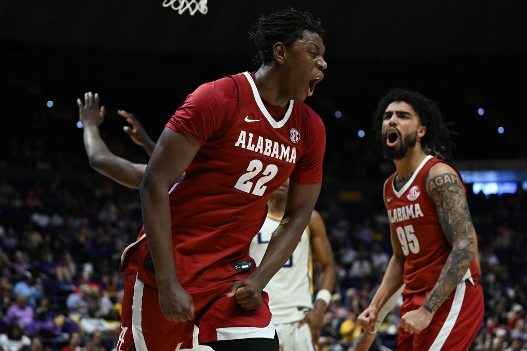Alabama forward Aiden Sherrell (22) reacts after a dunk during the second half of an NCAA basketball game against LSU in Baton Rouge, Saturday, Feb. 21, 2026. (AP Photo/Ella Hall)