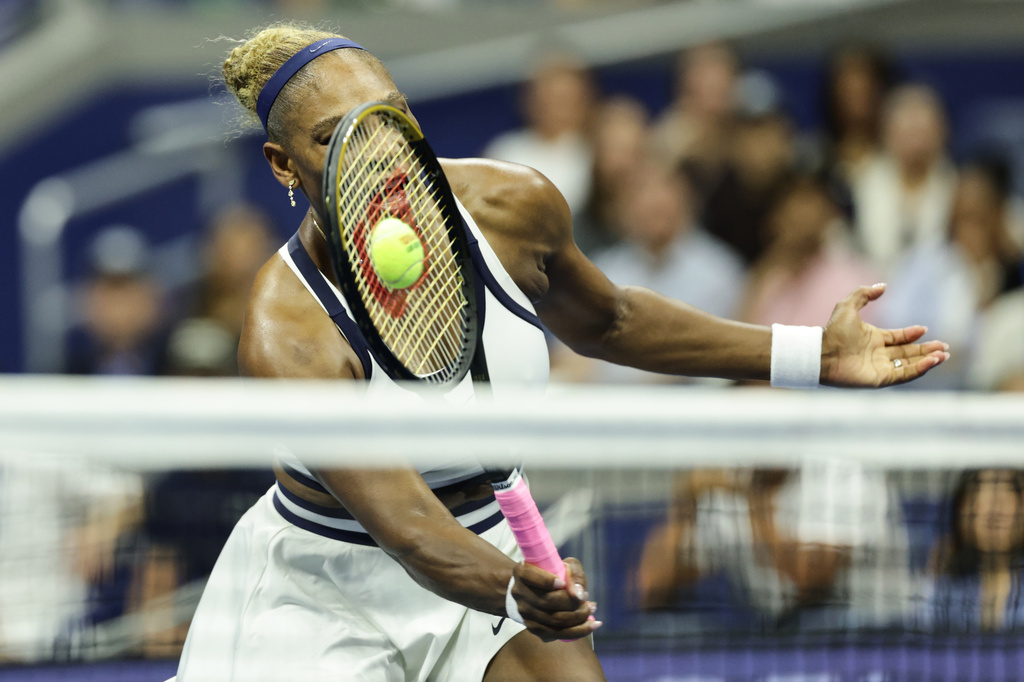 Serena Williams, of the United States, hits a return as she plays a women's doubles match with partner Venus Williams against Hao-Ching Chan, of Taiwan, and Maya Joint, at the U.S. Open tennis championships, Friday, Sept. 4, 2026, in New York. (AP Photo/Adam Hunger)