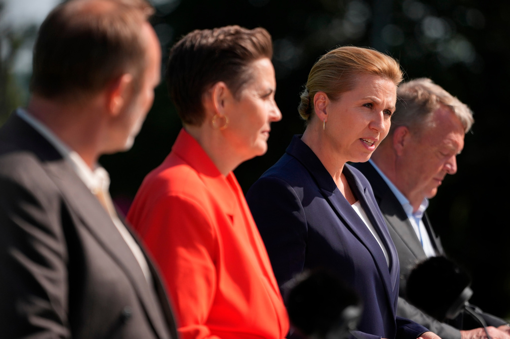 Party leaders Martin Lidegaard (The Social Liberal Party), Pia Olsen Dyhr (SF), incoming Danish Prime Minister Mette Frederiksen (Social Democrats), and Lars Loekke Rasmussen (Moderates) present the government platform for a new government in Denmark, at Marienborg in Kongens Lyngby, Tuesday, June 2, 2026. (Mads Claus Rasmussen/Ritzau Scanpix via AP)