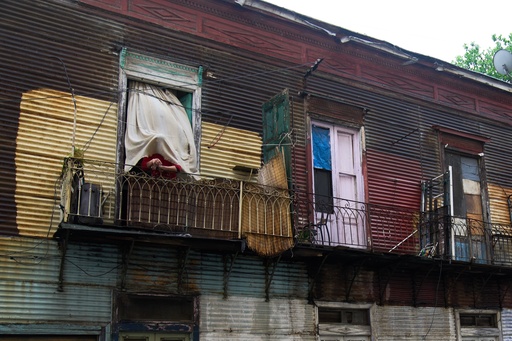 A person smokes on a balcony in the Isla Maciel neighborhood of Buenos Aires, Argentina, Friday, Oct. 24, 2025. (AP Photo/Rodrigo Abd) A person smokes on a balcony in the Isla Maciel neighborhood of Buenos Aires, Argentina, Friday, Oct. 24, 2025. (AP Photo/Rodrigo Abd)