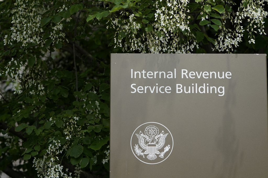 FILE - A sign for the Internal Revenue Service building is pictured in Washington, May 4, 2021. (AP Photo/Patrick Semansky, File)