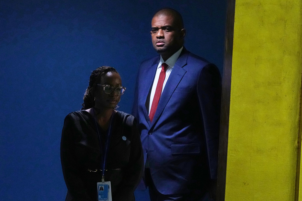 Tanzania's Vice President Deogratius Ndejembi is escorted to the podium to address the 81st session of the United Nations General Assembly at U.N. headquarters Tuesday, Sept. 22, 2026. (AP Photo/Frank Franklin II)