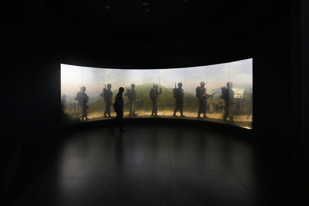 A visitor tours the exhibition hall of the Korean War at the War Memorial of Korea in Seoul, South Korea, Sunday, July 5, 2026. (AP Photo/Lee Jin-man)
