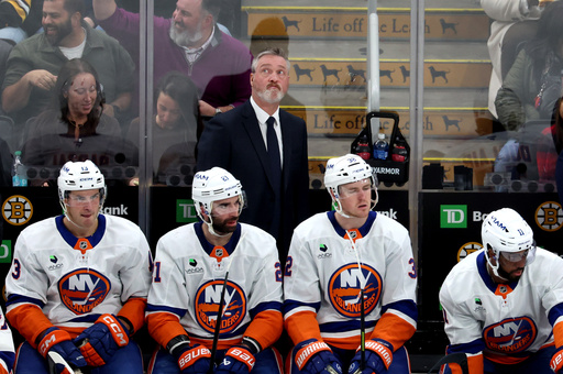 New York Islanders head coach Patrick Roy looks to the scoreboard during the third period of an NHL hockey game against the Boston Bruins, Tuesday, Oct. 28, 2025, in Boston. (AP Photo/Mark Stockwell) New York Islanders head coach Patrick Roy looks to the scoreboard during the third period of an NHL hockey game against the Boston Bruins, Tuesday, Oct. 28, 2025, in Boston. (AP Photo/Mark Stockwell)