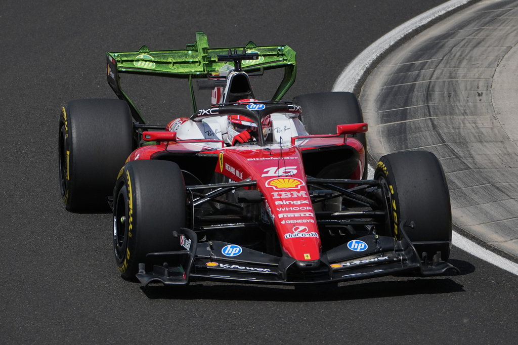 Monaco's Charles Leclerc steers his Ferrari during the first practice session ahead of Sunday's Formula One Hungarian Grand Prix auto race, at the Hungaroring racetrack in Mogyorod, near Budapest, Hungary, Friday, July 24, 2026. (AP Photo/Darko Vojinovic)