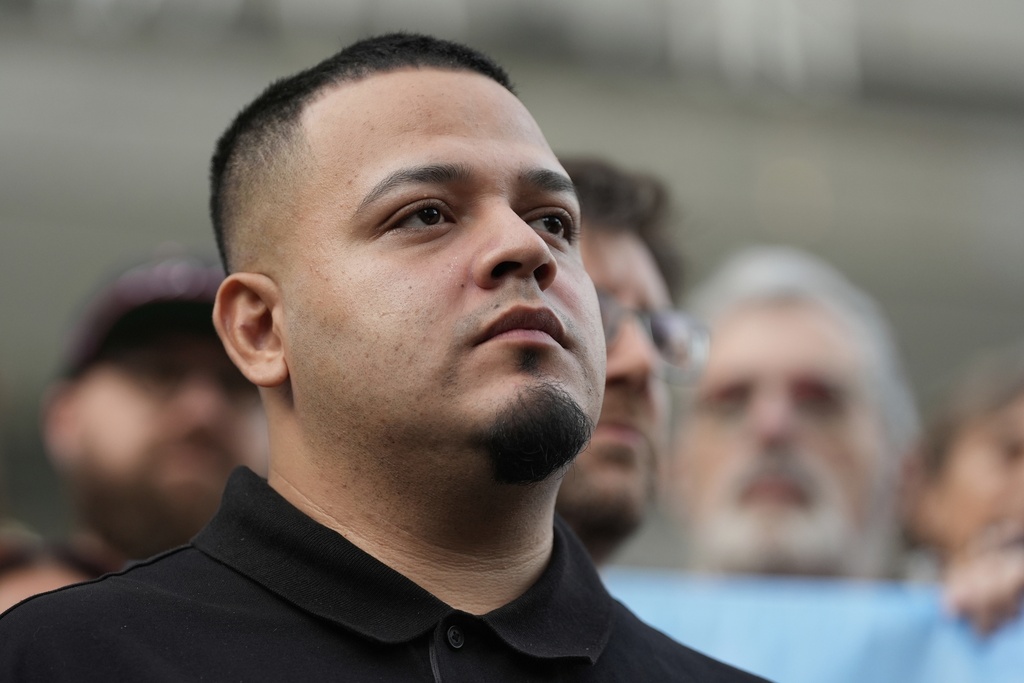 Kilmar Abrego Garcia attends a protest rally at the Immigration and Customs Enforcement field office in Baltimore, Monday, Aug. 25, 2025, to support Abrego Garcia. (AP Photo/Stephanie Scarbrough)