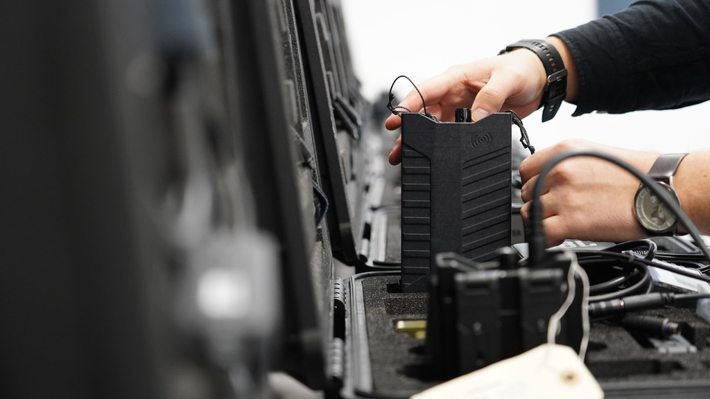 A worker packs away assembled counter drone devices at MyDefence's headquarters in Alborg, Denmark, on Oct. 28, 2025. (AP Photo/James Brooks)