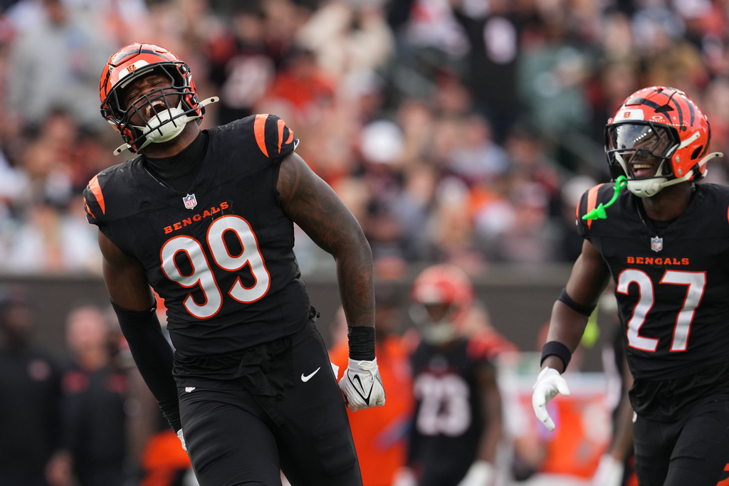 Cincinnati Bengals defensive end Myles Murphy (99) reacts after sacking Arizona Cardinals quarterback Jacoby Brissett, not pictured during the second half of an NFL football game Sunday, Dec. 28, 2025, in Cincinnati. (AP Photo/Jeff Dean)