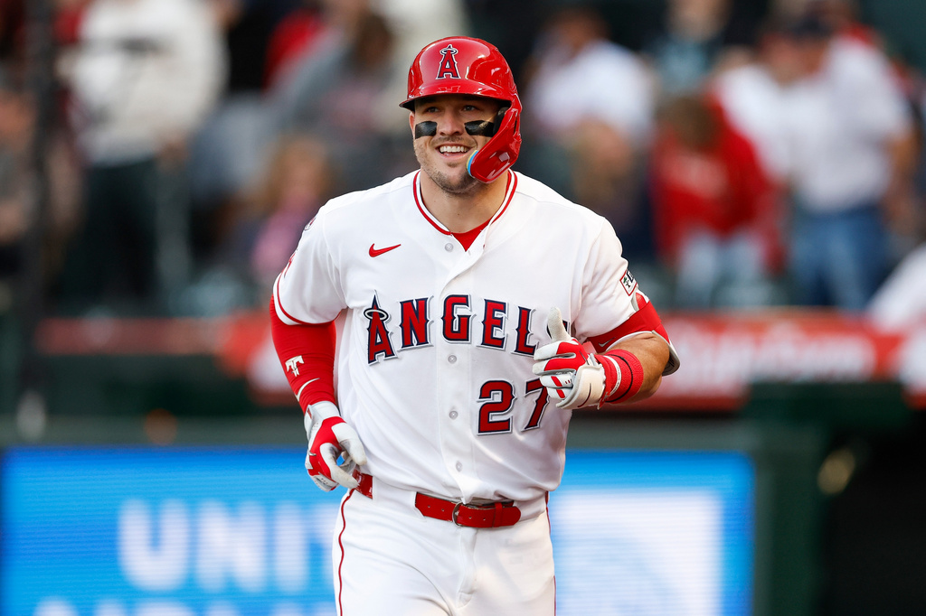 Los Angeles Angels' Mike Trout runs back to the dugout after hitting a two-run home run during the first inning of a baseball game against the Texas Rangers, Saturday, May 23, 2026, in Anaheim, Calif. (AP Photo/Caroline Brehman)