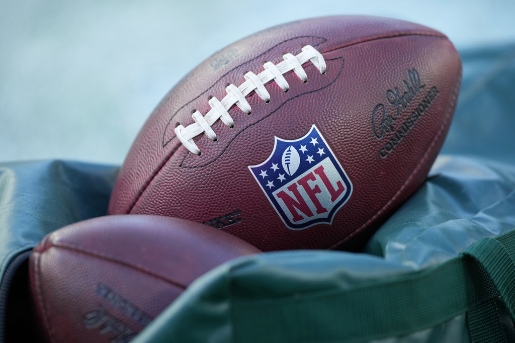 FILE - Footballs are seen before an NFL football game between the Philadelphia Eagles and the Washington Commanders on Jan. 4, 2026, in Philadelphia. (AP Photo/Matt Slocum, File)