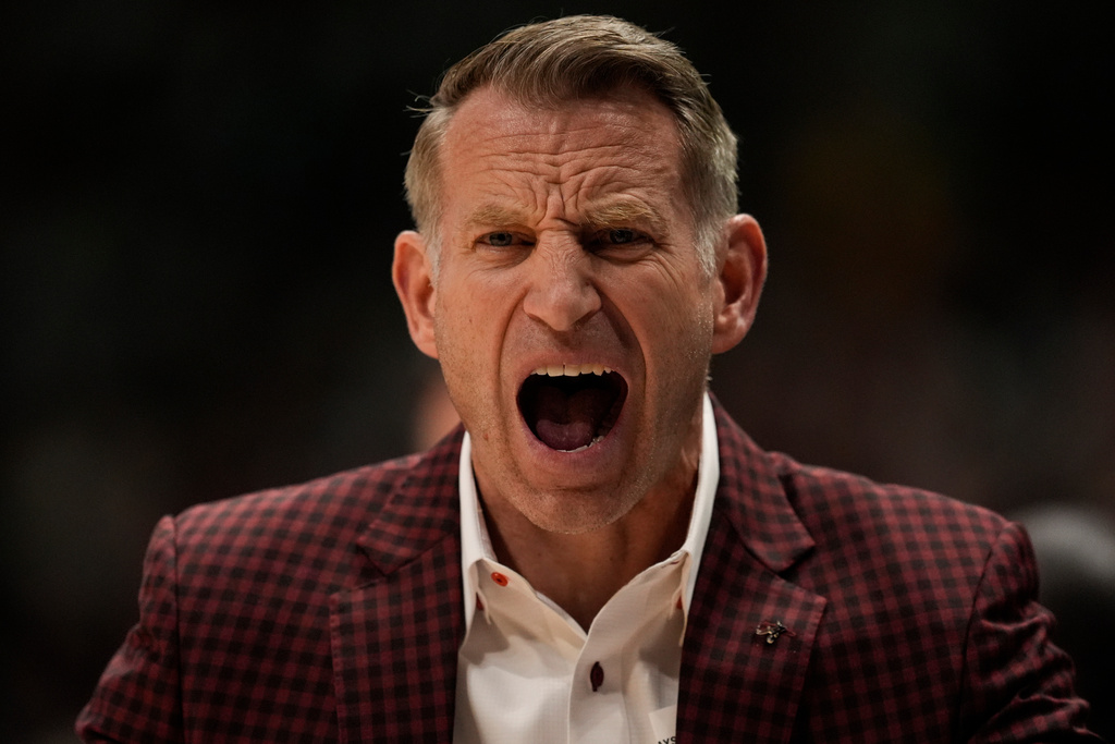 Alabama head coach Nate Oats speaks to players during the first half of an NCAA college basketball game in the quarterfinal round of the Southeastern Conference tournament against Mississippi, Friday, March 13, 2026, in Nashville, Tenn. (AP Photo/George Walker IV)