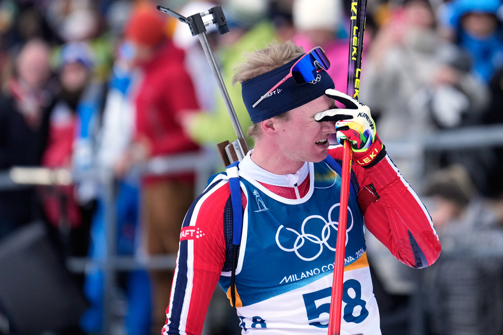 Johan-Olav Botn, of Norway, reacts after competing in the men's 20-kilometer individual biathlon race at the 2026 Winter Olympics in Anterselva, Italy, Tuesday, Feb. 10, 2026. (AP Photo/Mosa'ab Elshamy)