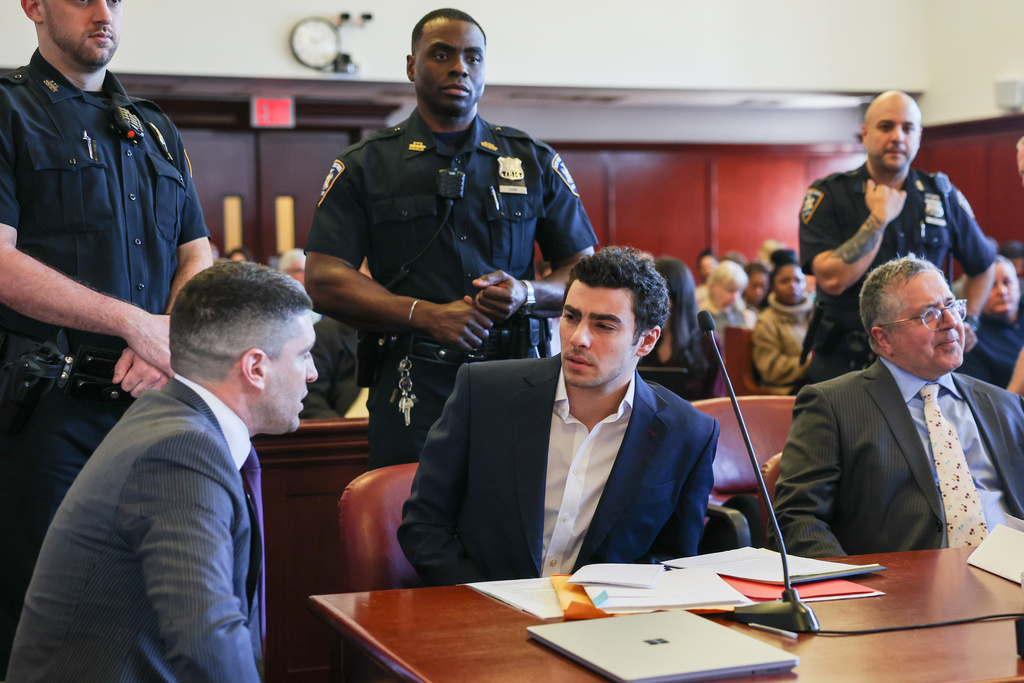 FILE - Luigi Mangione appears in Manhattan Criminal Court for an evidence hearing, Dec. 18, 2025, in New York. (Shannon Stapleton/Pool Photo via AP, File)
