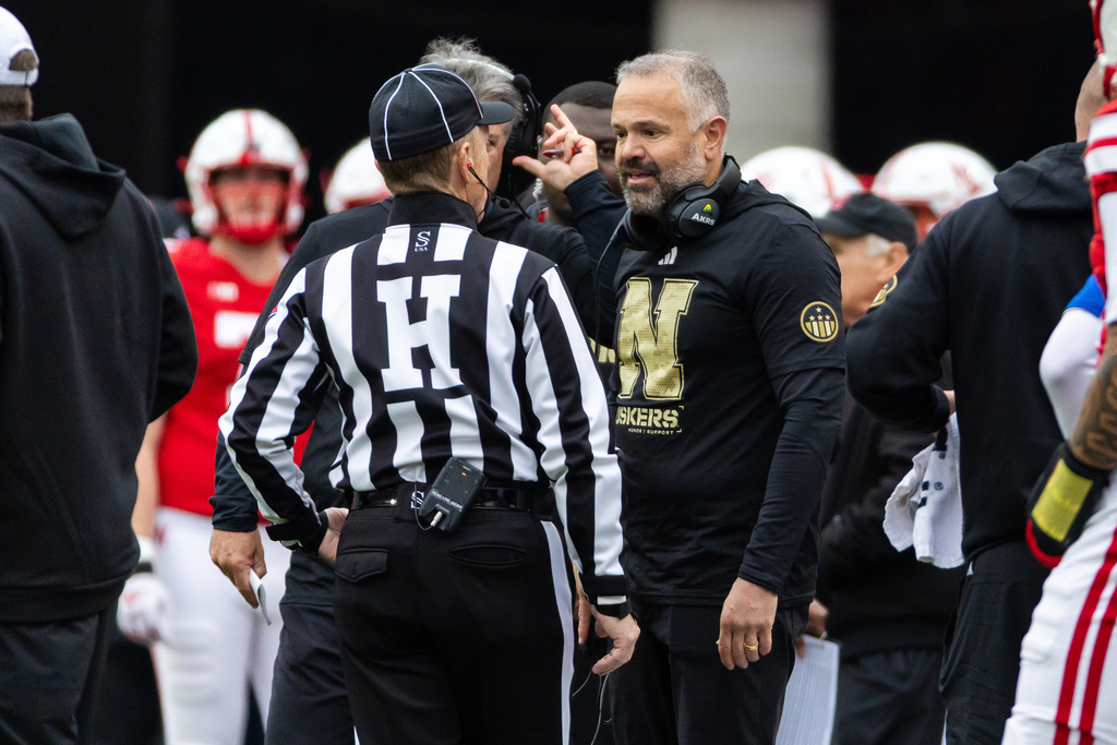 Nebraska head coach Matt Rhule speaks with an official during the first half of an NCAA college football game against Northwestern, Saturday, Oct. 25, 2025, in Lincoln, Neb. (AP Photo/Bonnie Ryan)