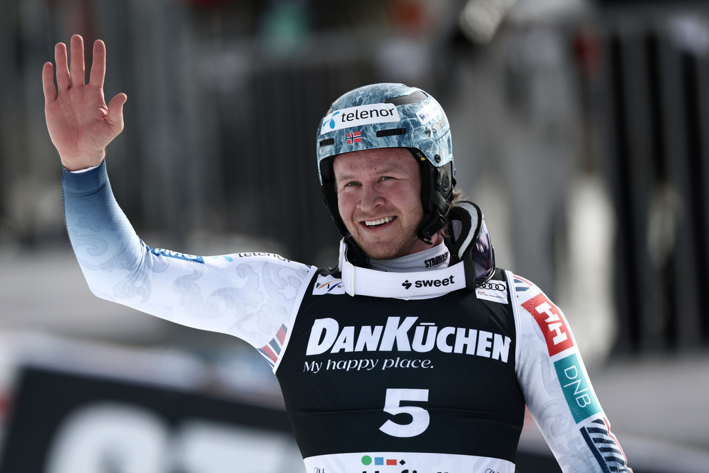 Norway's Timon Haugan celebrates winning an alpine ski, men's slalom race, at the Lillehammer World Cup Finals, in Hafjell, Norway, Wednesday, March 25, 2026. (AP Photo/Gabriele Facciotti)