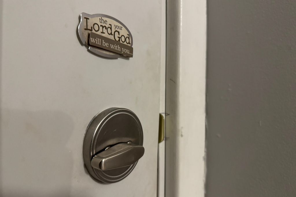 The inside of the door of a Minneapolis safe house where volunteers from the organization Source MN have hidden the children of an Ecuadorian woman who was detained by federal agents earlier this month. (AP Photo/Jack Brook)