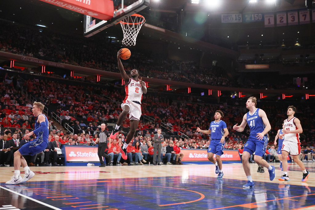 St. John's forward Sadiku Ibine Ayo (2) goes up to the basket during the second half of an NCAA college basketball game against Creighton, Saturday, Feb. 21, 2026, in New York. (AP Photo/Heather Khalifa)