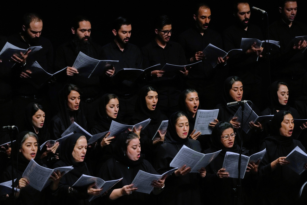 Choir performs in a Tehran Symphony Orchestra performance at Unity Hall in Tehran, Iran, Thursday, Aug. 6, 2026. (AP Photo/Vahid Salemi)