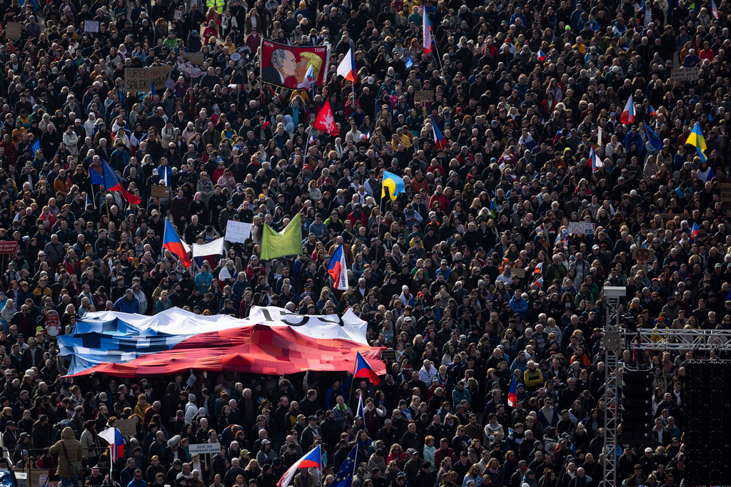 People gather to take part in a large anti-government protest in Prague, Czech Republic, Saturday, March 21, 2026. (AP Photo/Michal Turek)
