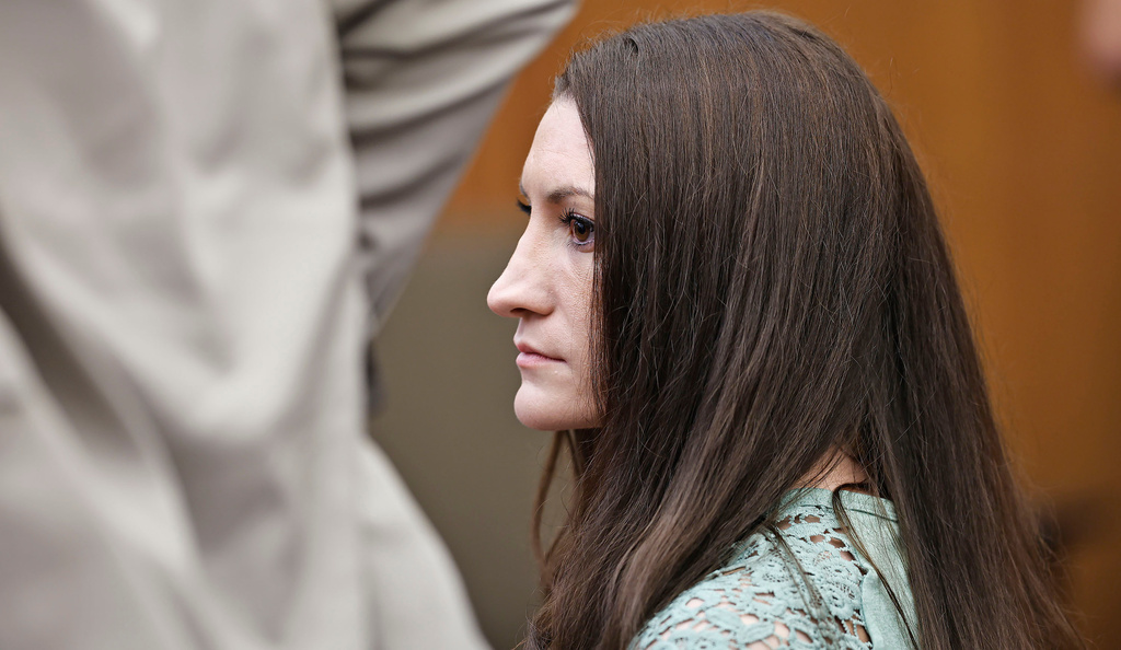 Lindsay Clancy watches jurors as they enter the courtroom to start their second day of deliberations in her murder trial at Plymouth Superior Court on Friday, Aug. 28, 2026 in Plymouth Mass. (Greg Derr/The Patriot Ledger via AP, Pool)