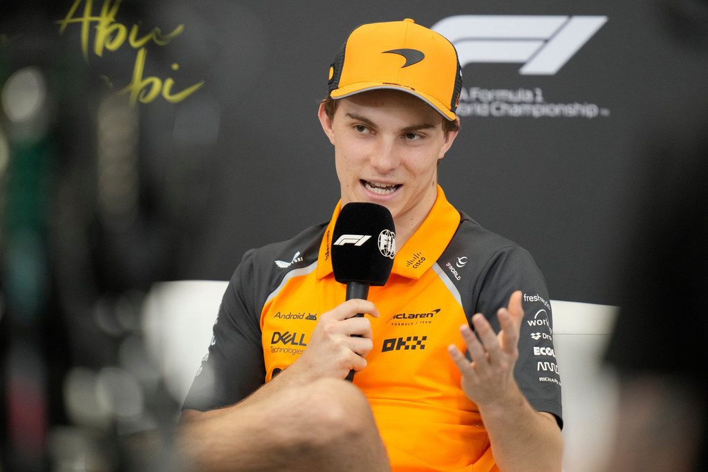 =McLaren driver Oscar Piastri of Australia attends a news conference ahead of the Abu Dhabi Grand Prix in Abu Dhabi, United Arab Emirates, Thursday, Dec. 4, 2025. (AP Photo/Darko Bandic)