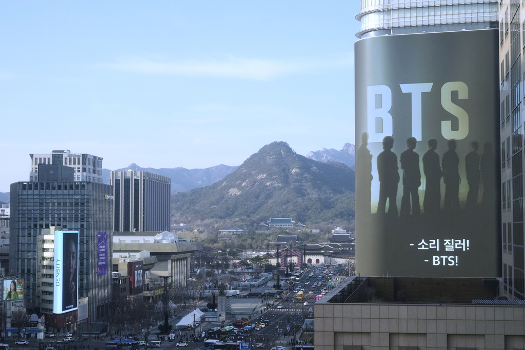 A screen promoting a comeback concert of K-pop boy group BTS is seen near Gwanghwamun Square in Seoul, South Korea, Thursday, March 19, 2026. (AP Photo/Ahn Young-joon)
