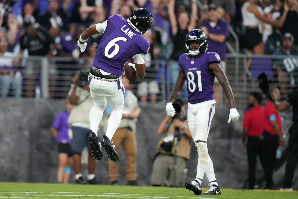 Baltimore Ravens wide receiver Ja'Kobi Lane (6) celebrates after scoring a touchdown against the Philadelphia Eagles during the first half of an NFL preseason football game Saturday, Aug. 15, 2026, in Baltimore. (AP Photo/Stephanie Scarbrough)