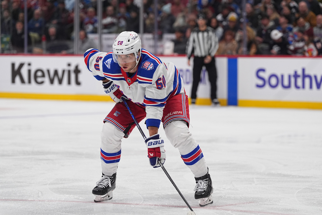 New York Rangers left wing Will Cuylle (50) in the second period of an NHL hockey game Thursday, Nov. 20, 2025, in Denver. (AP Photo/David Zalubowski)