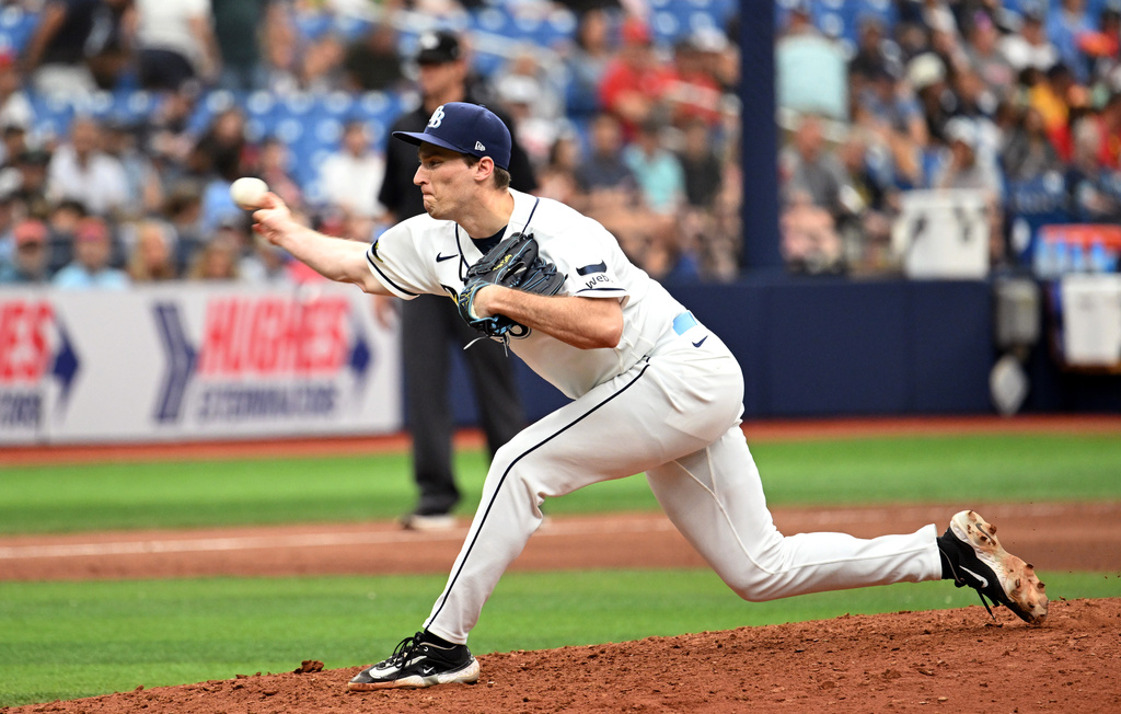 Tampa Bay Rays pitcher Kevin Kelly throws during the ninth inning of a baseball game against the Washington Nationals, Sunday, June 21, 2026, in St. Petersburg, Fla. (AP Photo/Jason Behnken)