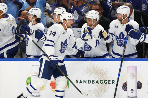 Toronto Maple Leafs center Auston Matthews (34) celebrates after his goal during the first period of an NHL hockey game against the Buffalo Sabres, Friday, Oct. 24, 2025, in Buffalo, N.Y. (AP Photo/Jeffrey T. Barnes) Toronto Maple Leafs center Auston Matthews (34) celebrates after his goal during the first period of an NHL hockey game against the Buffalo Sabres, Friday, Oct. 24, 2025, in Buffalo, N.Y. (AP Photo/Jeffrey T. Barnes)